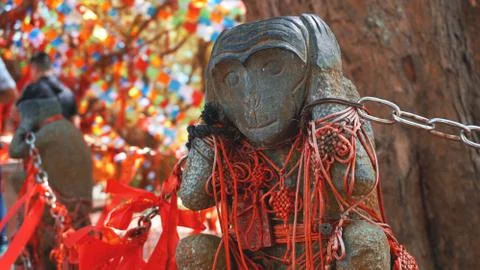 Hear no evil monkey statue in China Stock Photos