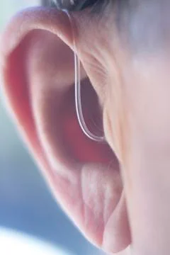 Hearing aid in ear Stock Photos