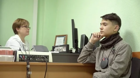 Hearing aid setting. Center of hearing aid for the selection and adjustment of Stock Footage 82519628