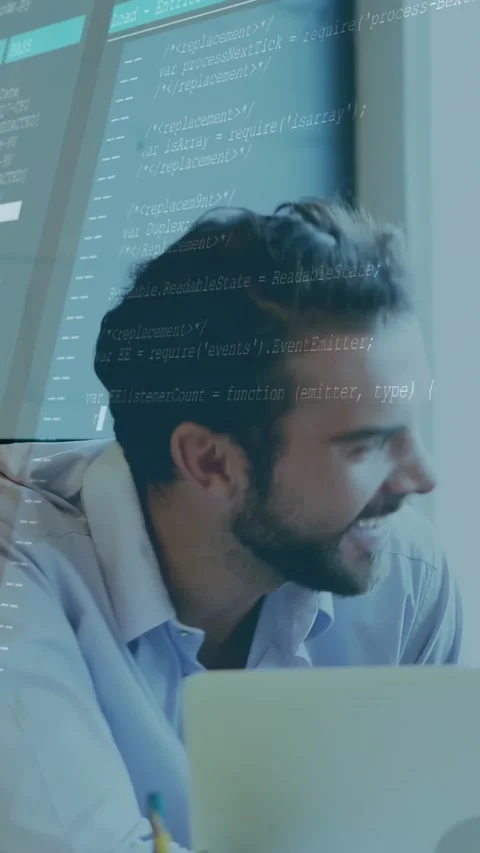 Hearing question, bearded developer leaning, laughing, returning to laptop for Stock Footage 330273111