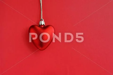 Heart and red background Stock Photos