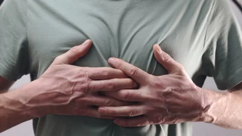 Heart attack, acute chest, solar plexus pain, hurt, burn concept Stock Footage 233504434