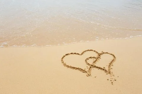 Heart on the beach Stock Photos