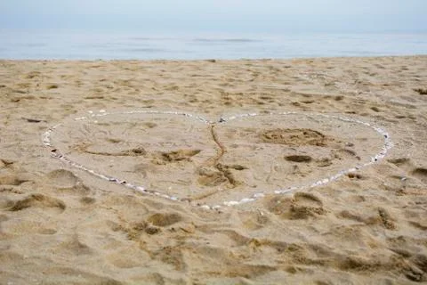 Heart on the beach Stock Photos