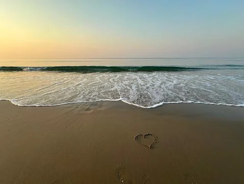 Heart on the beach Stock Photos