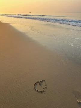 Heart on the beach Stock Photos