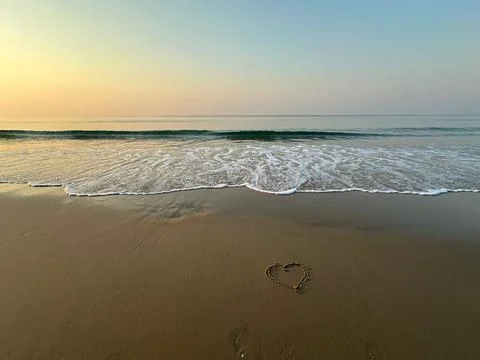 Heart on the beach Stock Photos