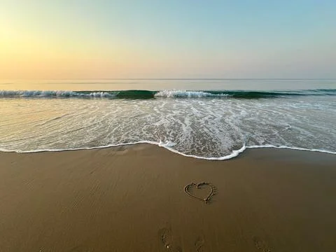 Heart on the beach Stock Photos