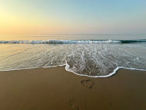 Heart on the beach Stock Photos
