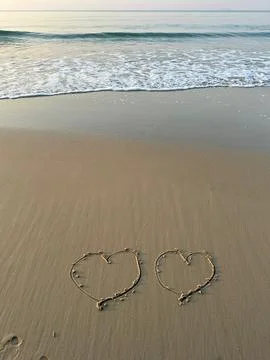 Heart on the beach Stock Photos