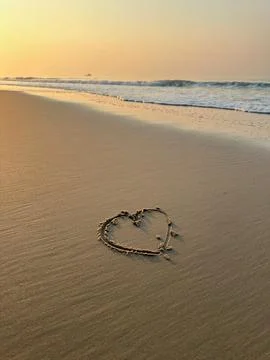 Heart on the beach Stock Photos