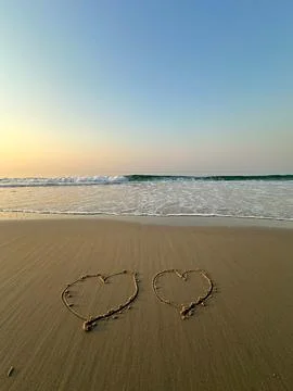 Heart on the beach Stock Photos