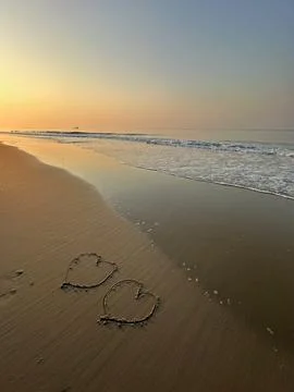 Heart on the beach Stock Photos