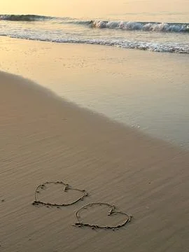 Heart on the beach Stock Photos