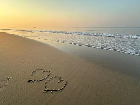 Heart on the beach Stock Photos