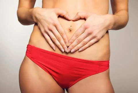 Heart on belly Stock Photos