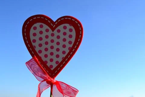 Heart with bow Stock Photos
