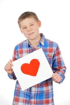 Heart in boy hands Stock Photos