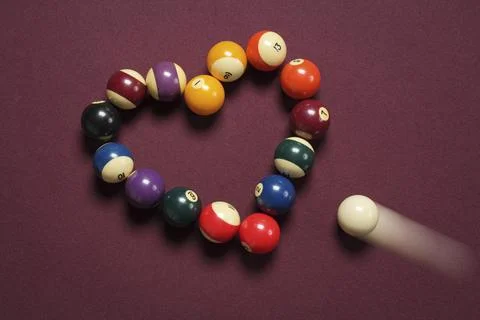 Heart break concept using billiard balls Stock Photos