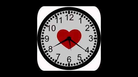 Heart-Centered Clock Animation on Black Background Stock Footage 309884941