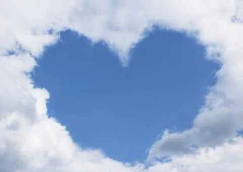 Heart of clouds Stock Photos