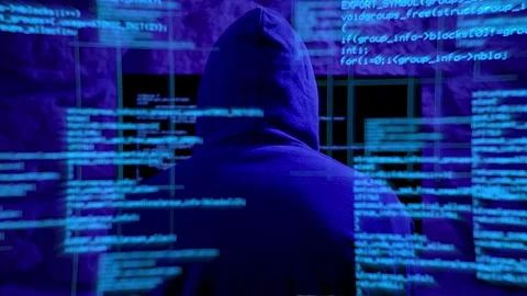  In the Heart of Code: A Coder's Focused Analysis Amidst Cyberspace Stock Footage 270573518