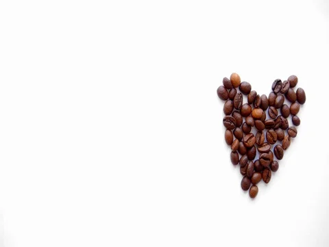 Heart from coffee beans on white background Stock Footage 73854764