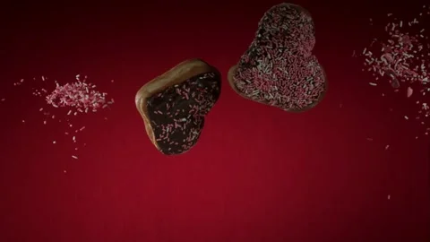 Heart donuts fly through red studio space Stock Footage 326751415