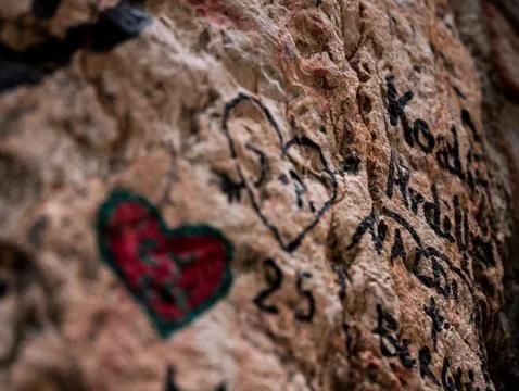 Heart drawn with a marker for a dedication on the wall near Juliet's balcony Stock Photos