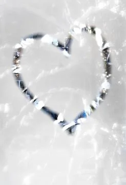 Heart drawn on a misted winter window Foto stock