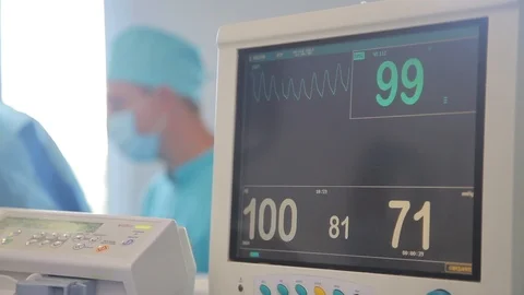 Heart Failure Rate. On the background group of doctors, patient, during surgery Stock-Footage 99198284