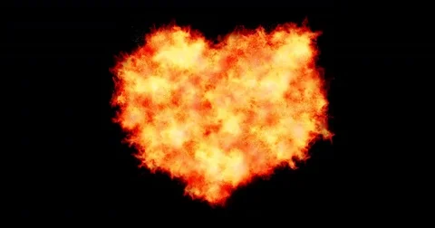 Heart filled made by burning flames on black background with fire particles Stock-Footage 72235380