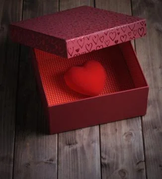 Heart in a gift box Stock Photos