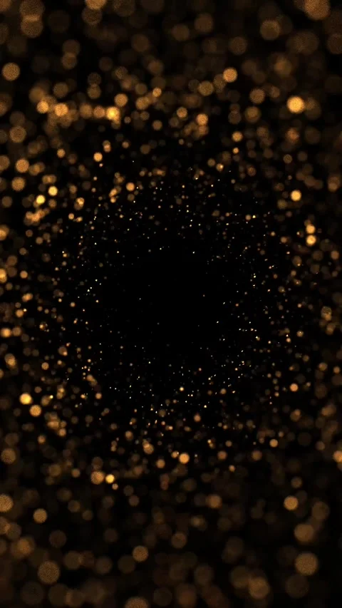 A heart of glittering gold particles forms, flying forward with a bokeh blu.. Stock Footage 295764595
