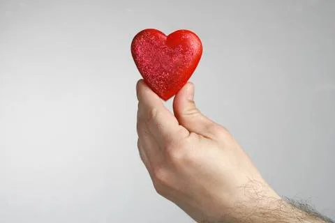 Heart in hand Stock Photos