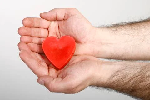 Heart in hand Stock Photos