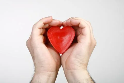 Heart in hand Stock Photos