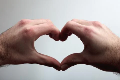 Heart in a hand Stock Photos