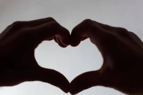 Heart in a hand Stock Photos
