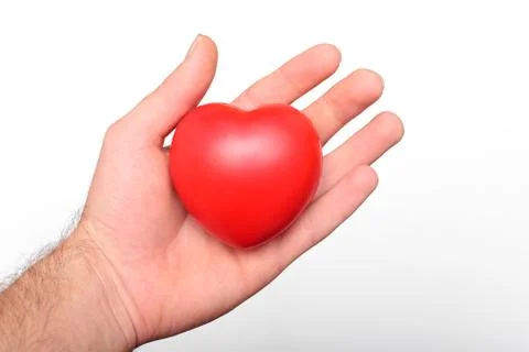 Heart in a hand Stock Photos