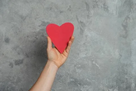 Heart in hand Stock Photos