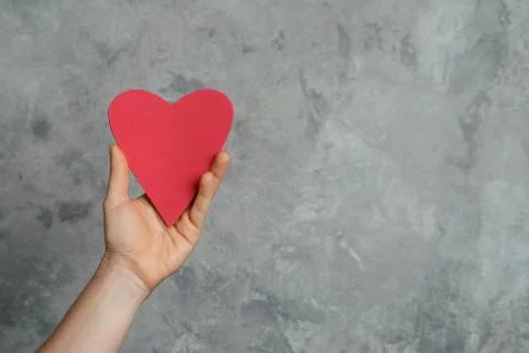 Heart in hand Stock Photos