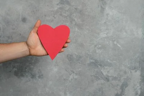 Heart in hand Stock Photos