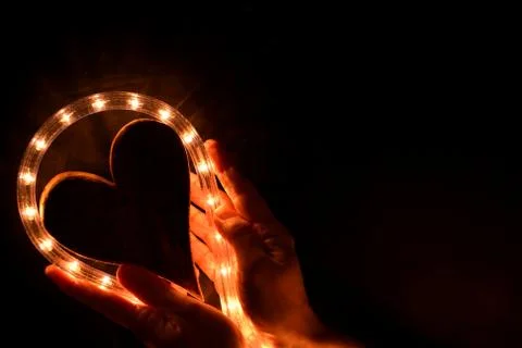 Heart in hands Stock Photos