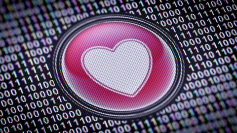 Heart icon. Binary code ( array of bits ) in the screen. Looping footage Stock Footage 110603380