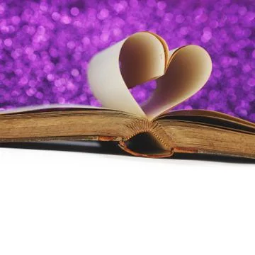 Heart inside a book Stock Photos