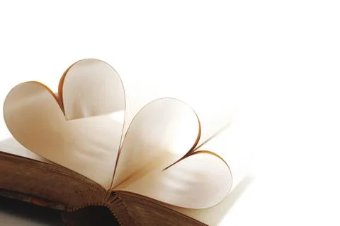 Heart inside a book Stock Photos