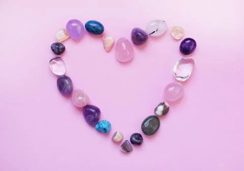 The heart is lined with natural minerals. Semi-precious stones of different c Stock Photos