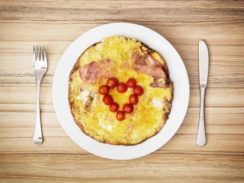 Heart made of cherry tomatoes on the ham and eggs for valentines breakfast Stock Photos