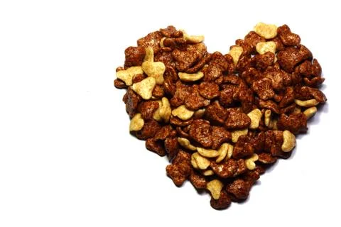 Heart made from cornflakes Stock Photos